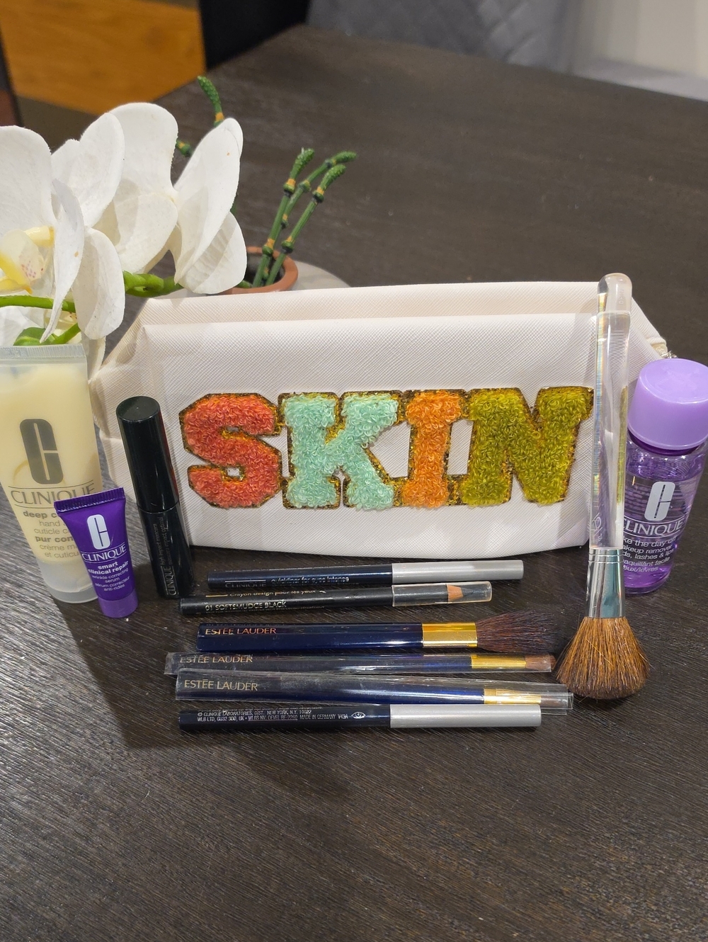 Clinique & Estée Products And With 'SKIN' Cosmetic Bag All New And Unused